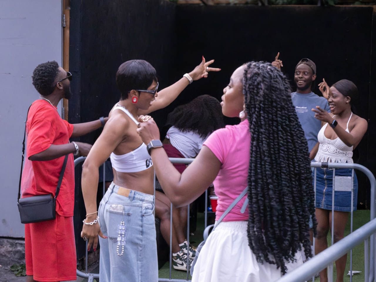 People enjoying a live cultural performance at Dodo Festival